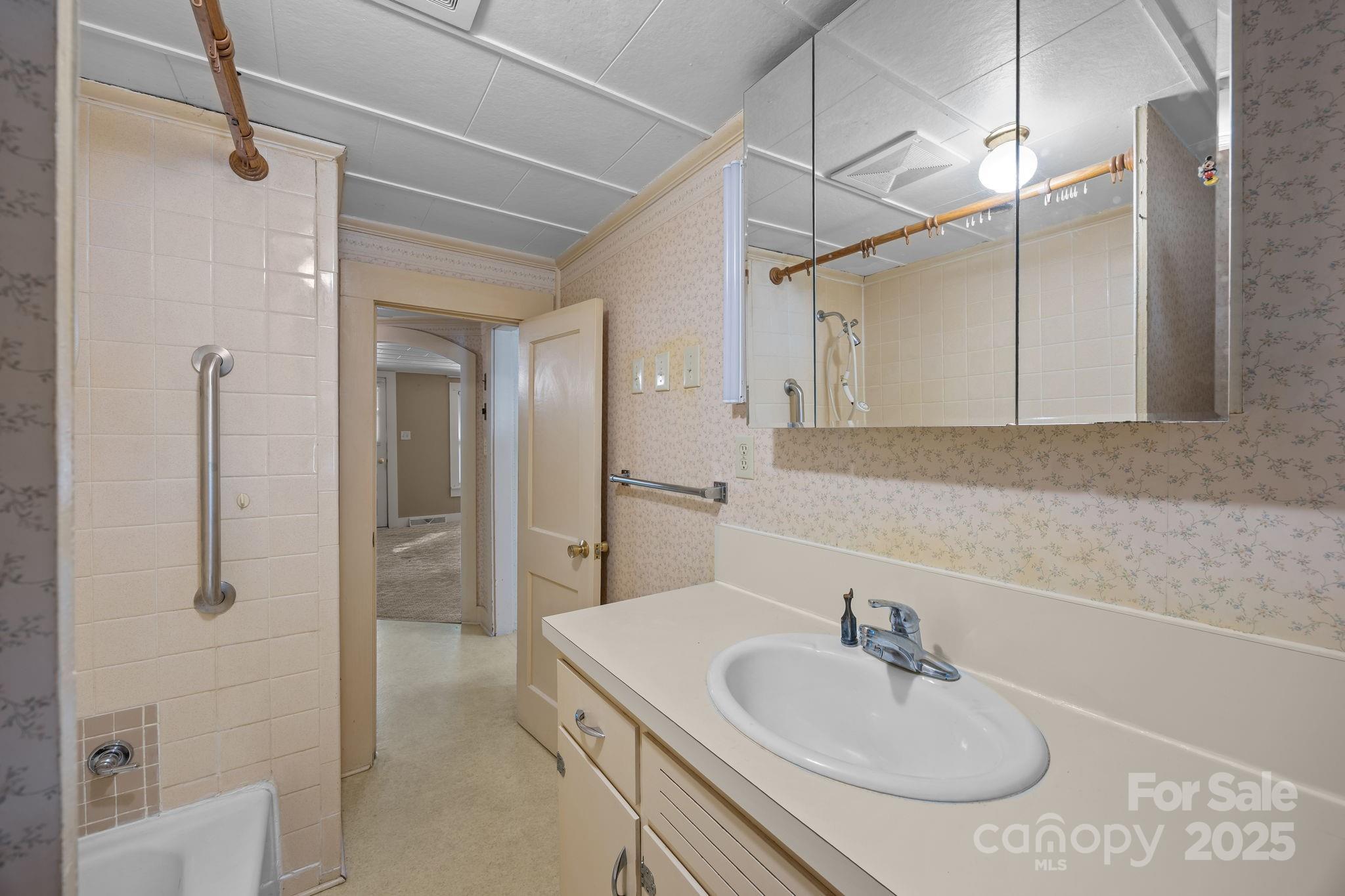 3020 Old Union Church Road Salisbury, NC 28146 - Photo 22 of 48 a bathroom with a sink and a mirror