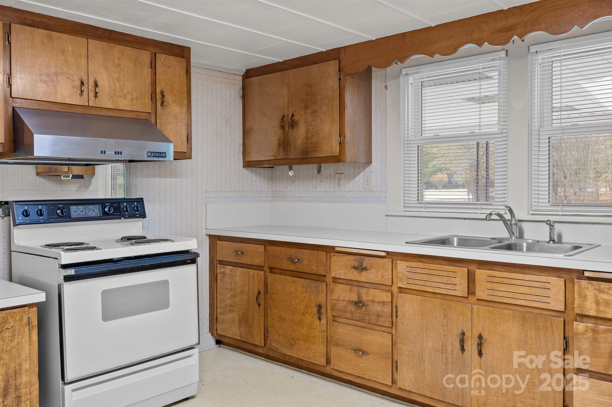 3020 Old Union Church Road Salisbury, NC 28146 - Photo 26 of 48 a kitchen with granite countertop cabinets stainless steel appliances and a sink