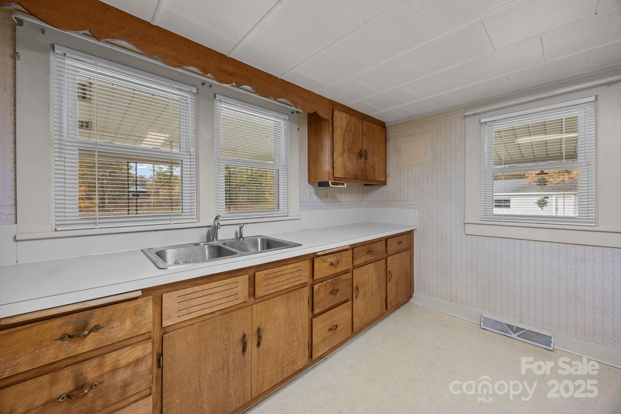 3020 Old Union Church Road Salisbury, NC 28146 - Photo 29 of 48 a kitchen with sink cabinets and window