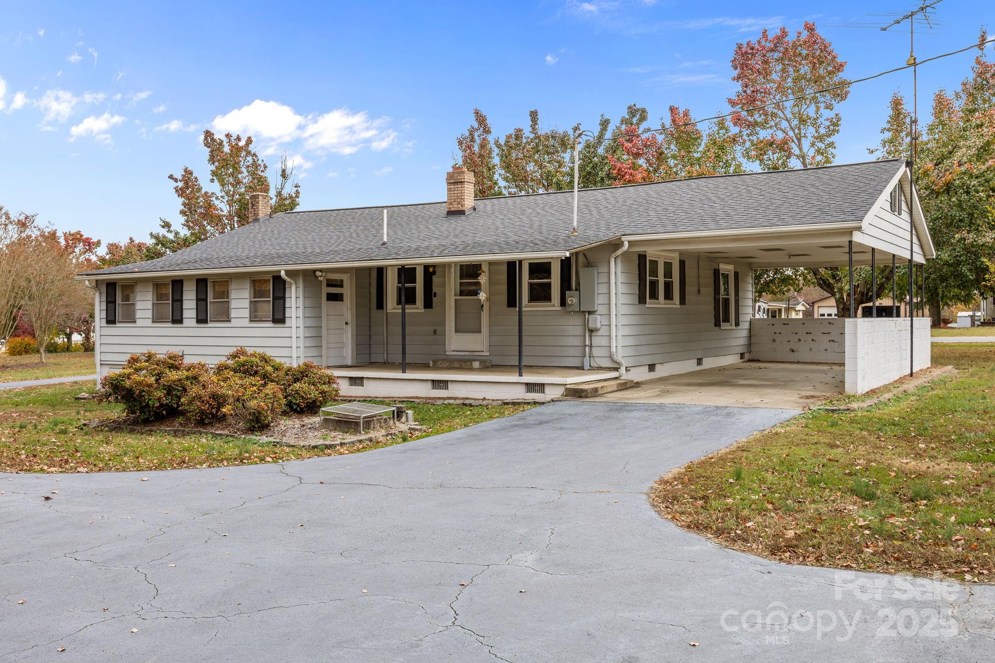 3020 Old Union Church Road Salisbury, NC 28146 - Photo 34 of 48 a front view of a house with yard and glass windows