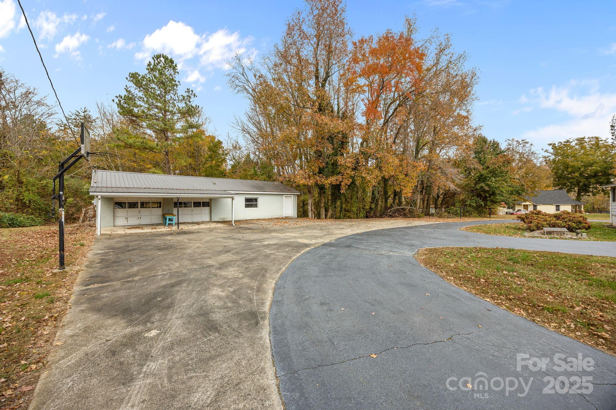 3020 Old Union Church Road Salisbury, NC 28146 - Photo 38 of 48 a front view of a house with a yard and trees