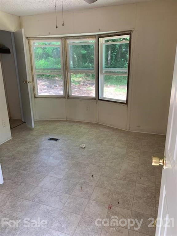 1220 Woodridge Road, Unit 5 Clover, SC 29710 - Photo 4 of 9 a view of an empty room with a window