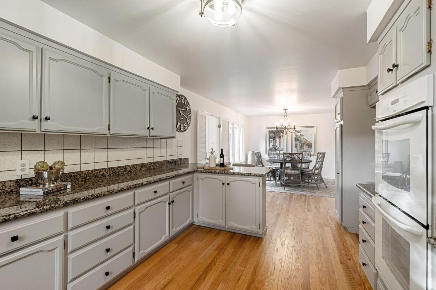 16 Valley Road Atherton, CA 94027 - Photo 31 of 100 a kitchen with sink cabinets and wooden floor