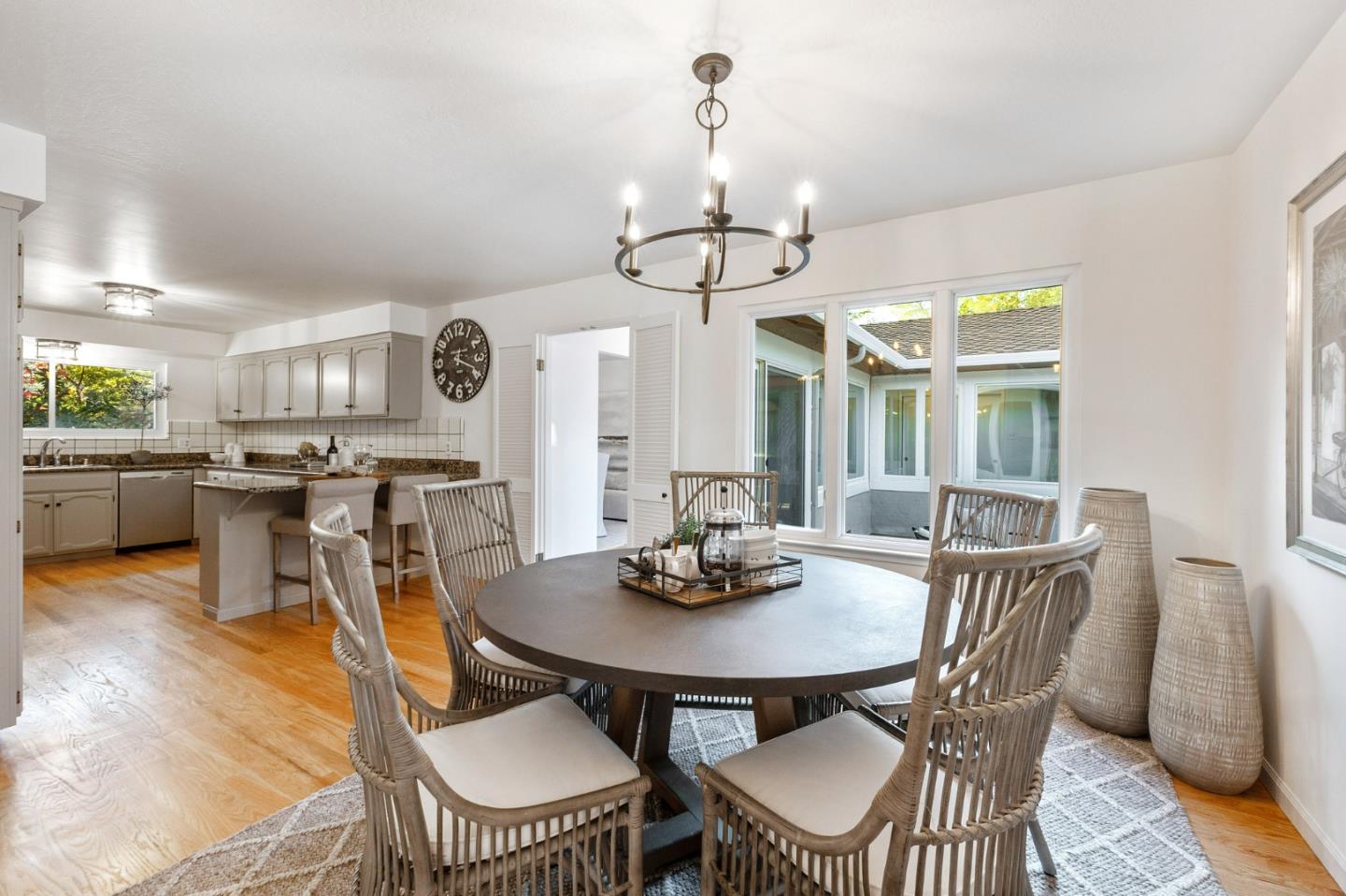 16 Valley Road Atherton, CA 94027 - Photo 32 of 100 a view of a dining room with furniture window and wooden floor