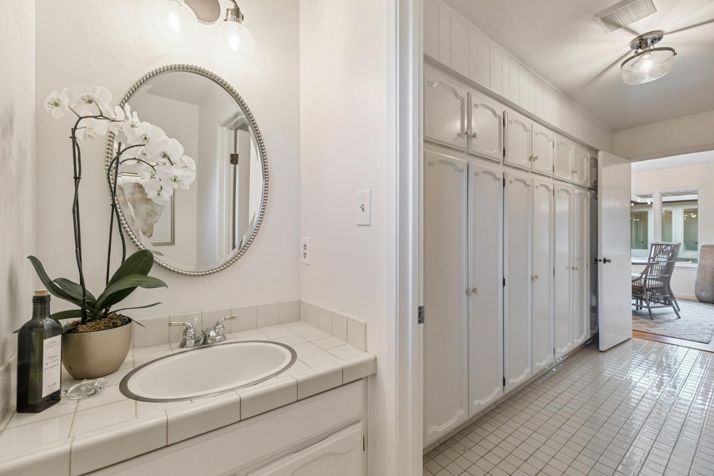 16 Valley Road Atherton, CA 94027 - Photo 34 of 100 a bathroom with a double vanity sink and a mirror