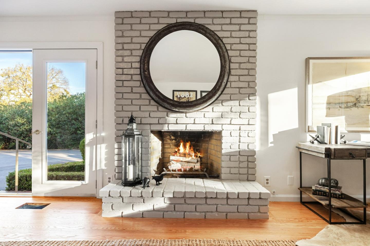 16 Valley Road Atherton, CA 94027 - Photo 45 of 100 a living room with furniture a fireplace and a large window