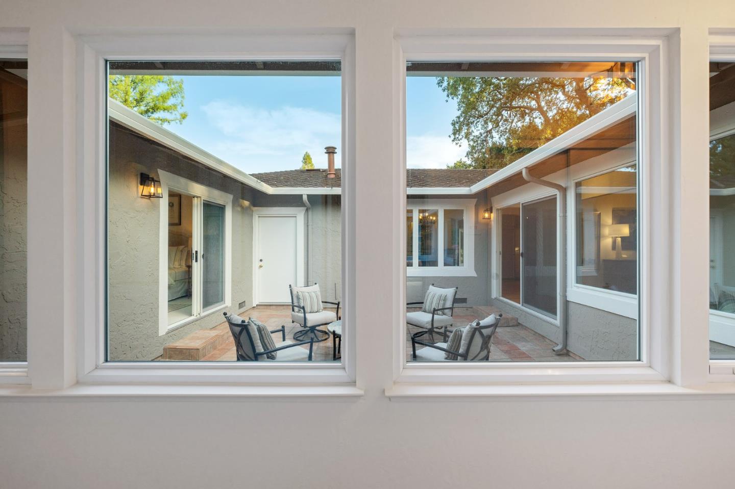 16 Valley Road Atherton, CA 94027 - Photo 49 of 100 a view of a brick house with a large window