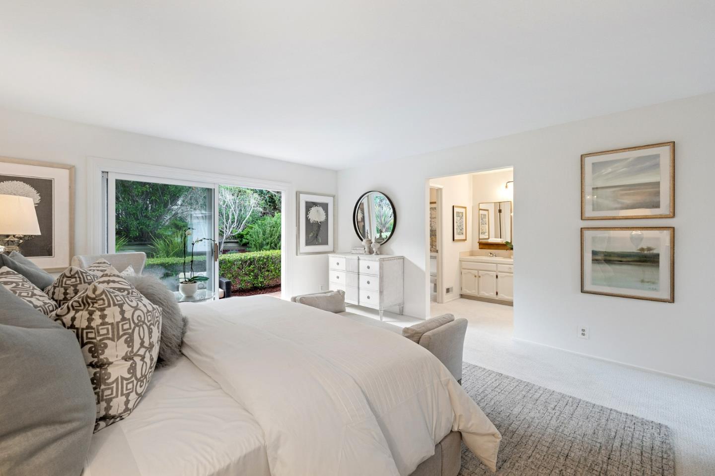 16 Valley Road Atherton, CA 94027 - Photo 53 of 100 a bedroom with a large bed and a large window