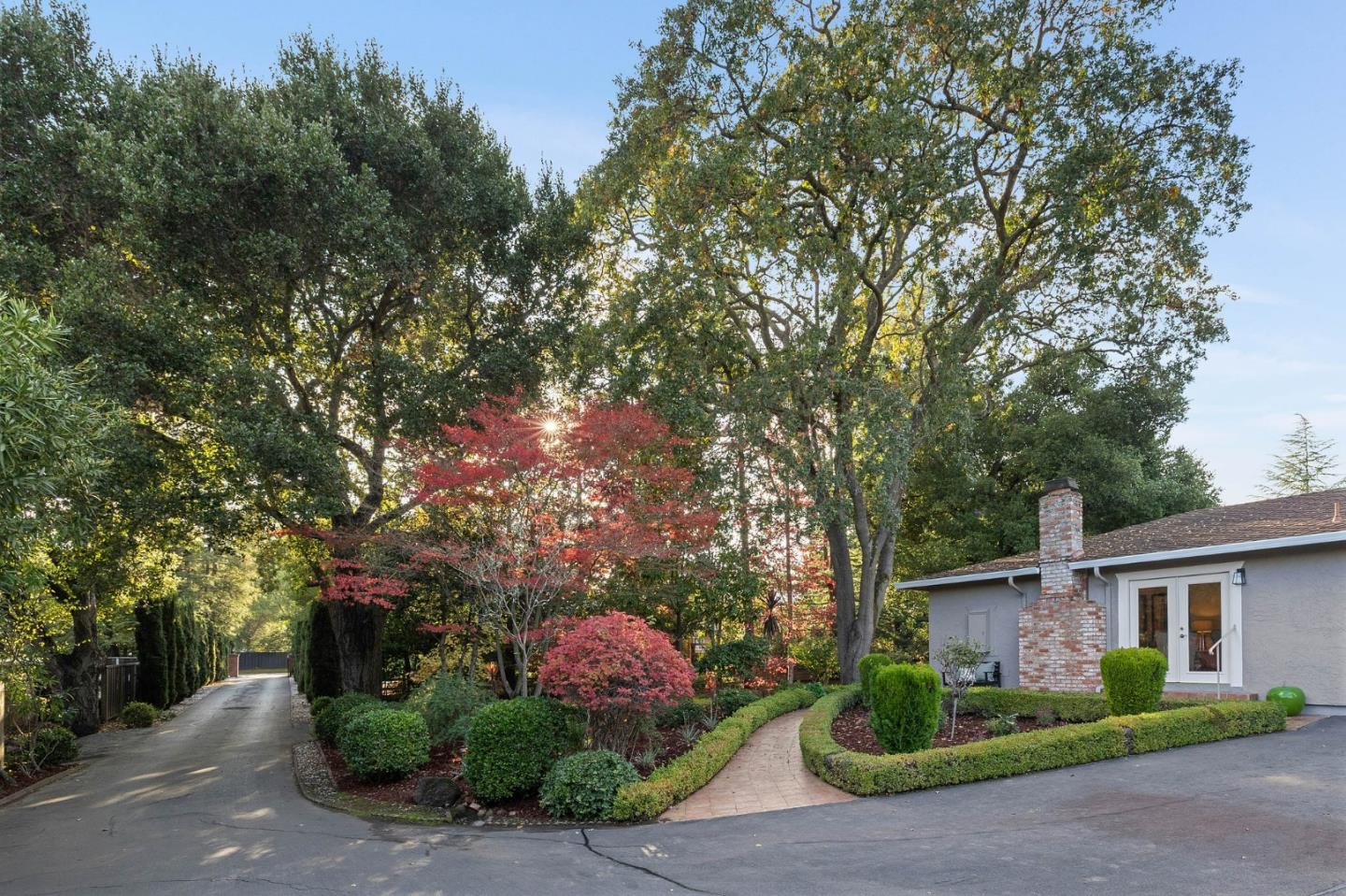 16 Valley Road Atherton, CA 94027 - Photo 8 of 100 a front view of a house with garden