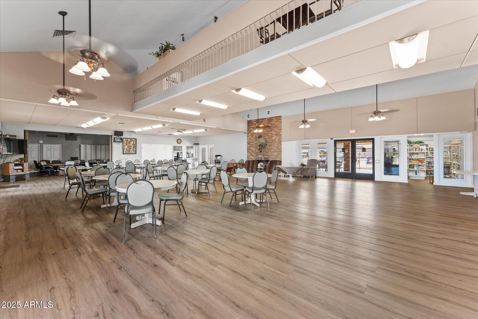 5735 East McDowell Road, Unit 243 Mesa, AZ 85215 - Photo 25 of 42 a room with lots of furniture and lots of furniture