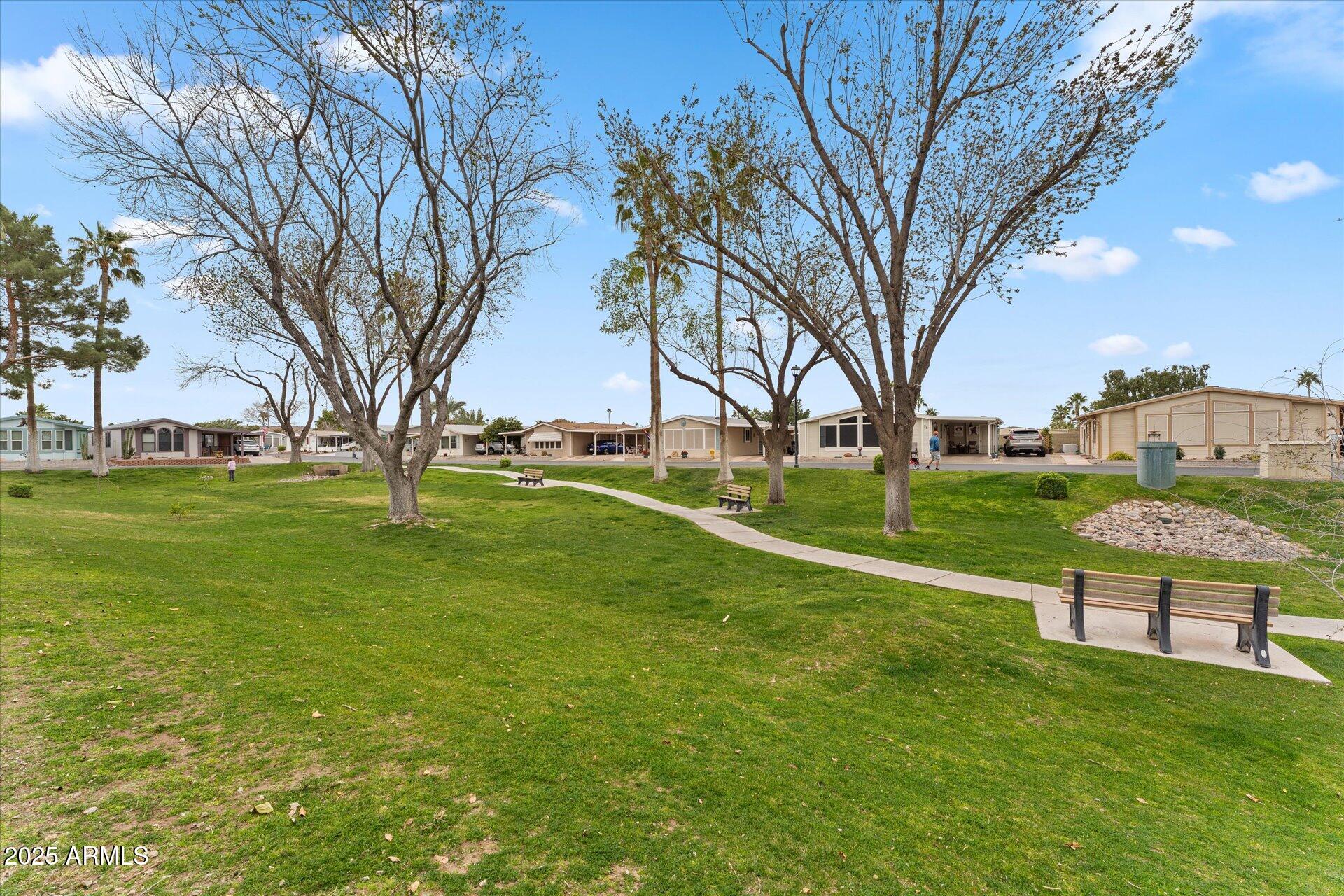 5735 East McDowell Road, Unit 243 Mesa, AZ 85215 - Photo 29 of 42 a view of a park with large trees