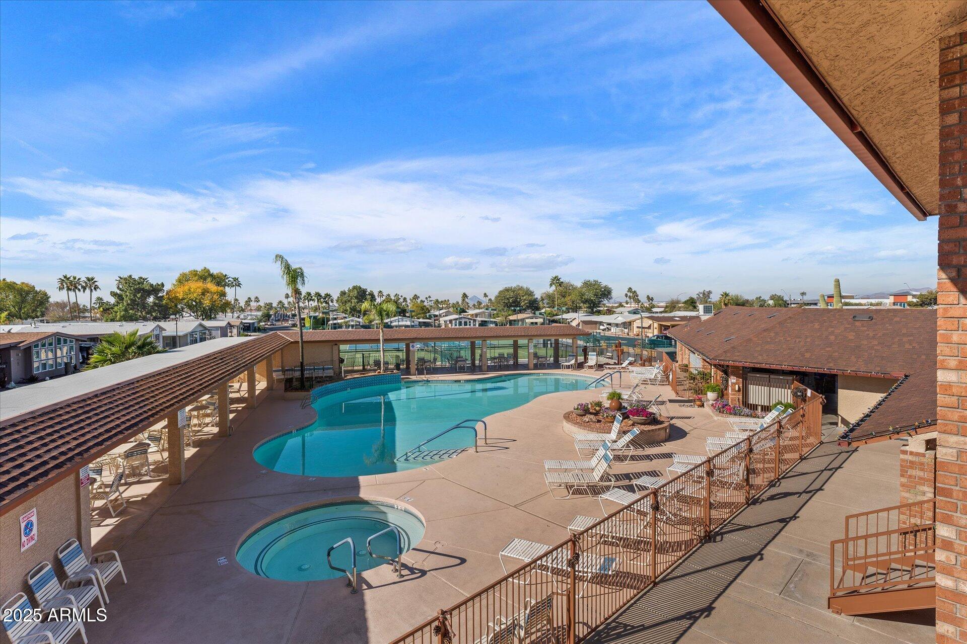 5735 East McDowell Road, Unit 243 Mesa, AZ 85215 - Photo 32 of 42 a view of a balcony with city view
