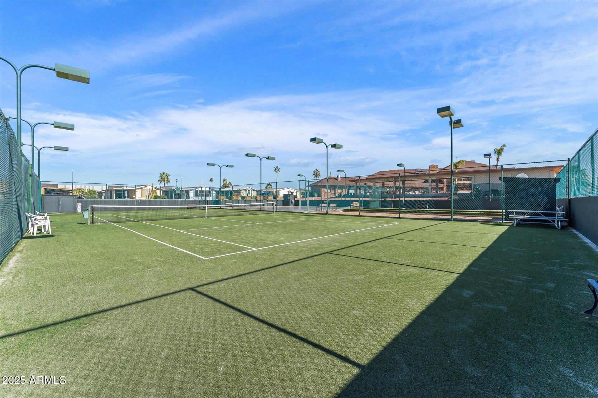 5735 East McDowell Road, Unit 243 Mesa, AZ 85215 - Photo 38 of 42 a view of a tennis ground