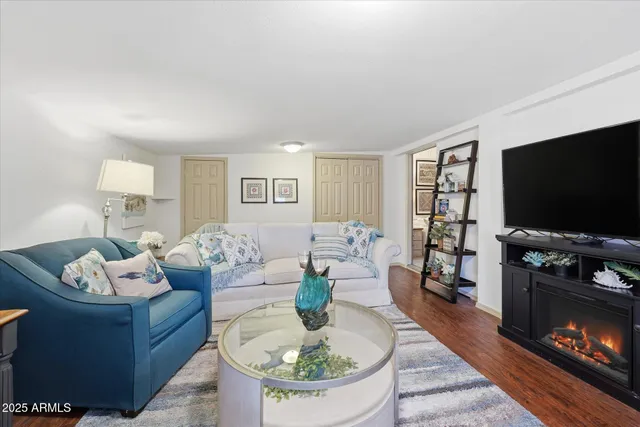 a living room with furniture and a window