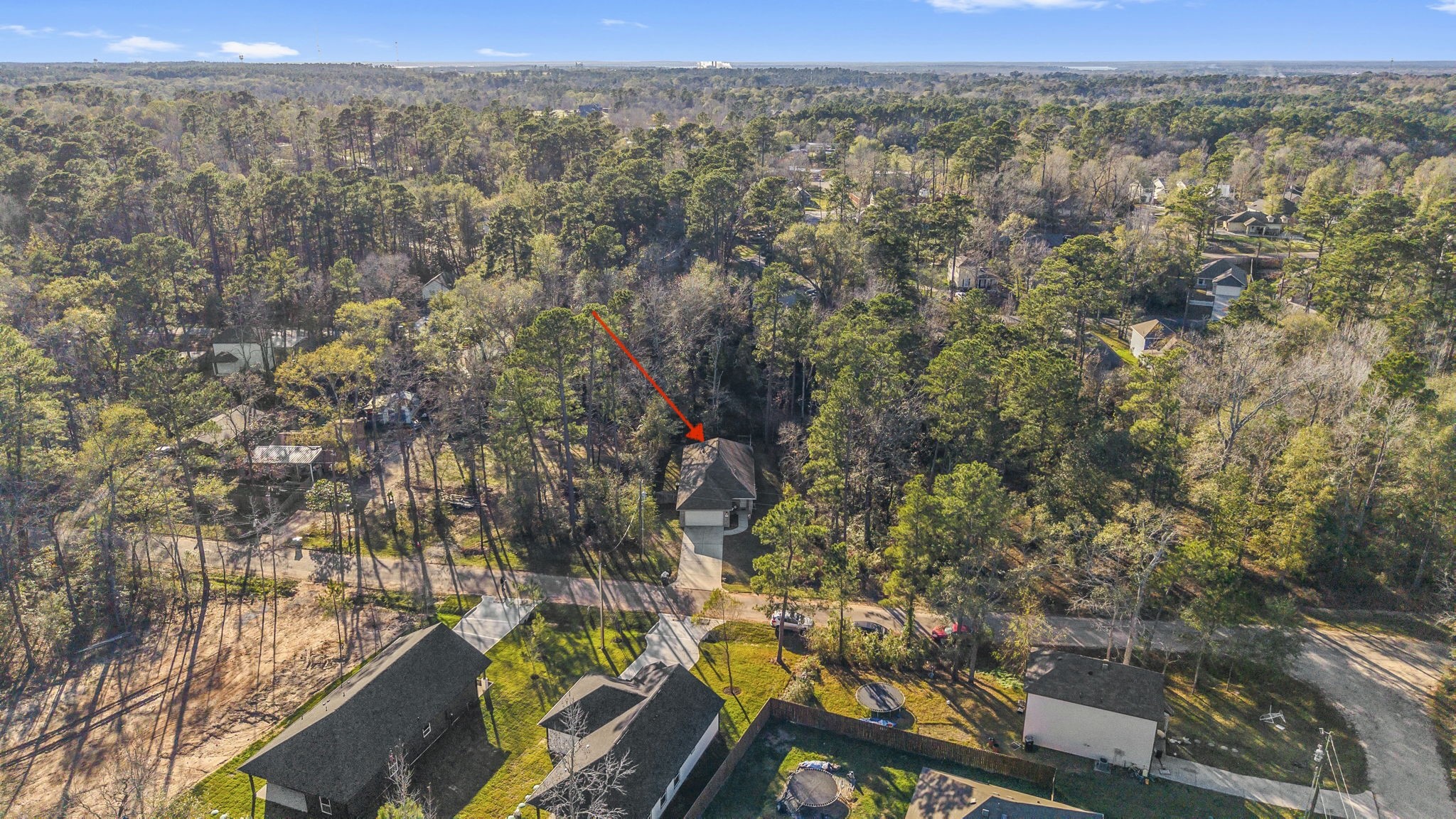 15120 Arrowhead Loop East Willis, TX 77378 - Photo 19 of 22 a view of a city