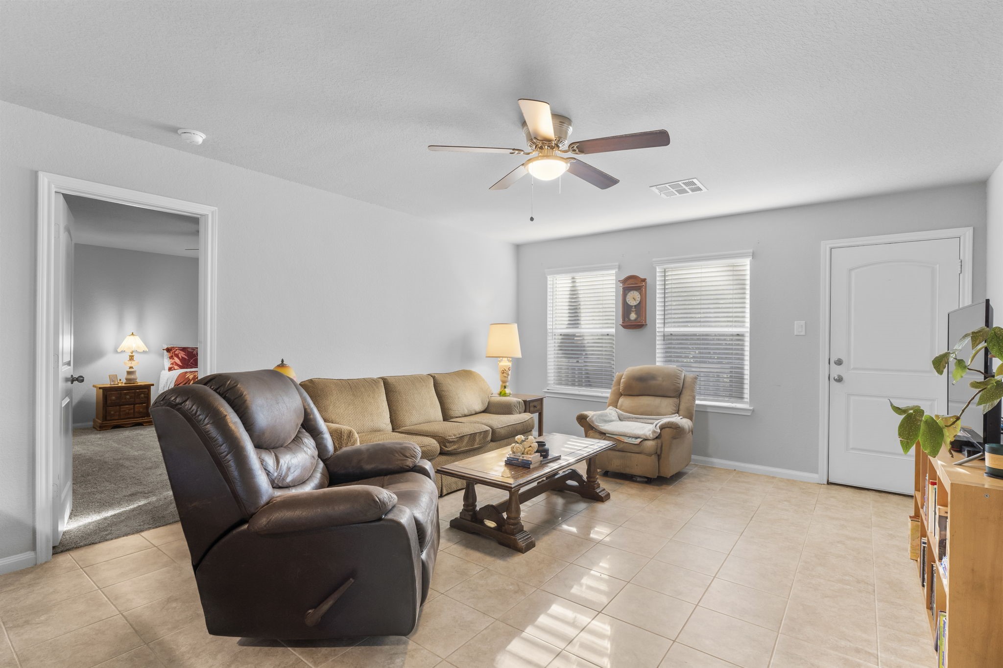 15120 Arrowhead Loop East Willis, TX 77378 - Photo 9 of 22 a living room with furniture