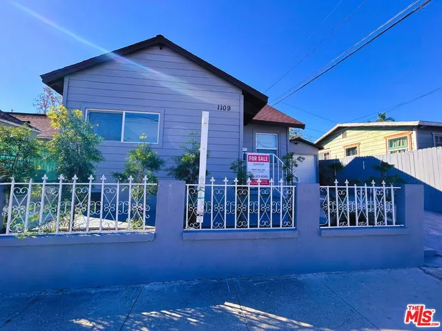 a house view with a garden space