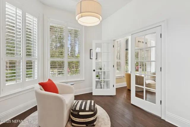 a white bath tub sitting next to a window