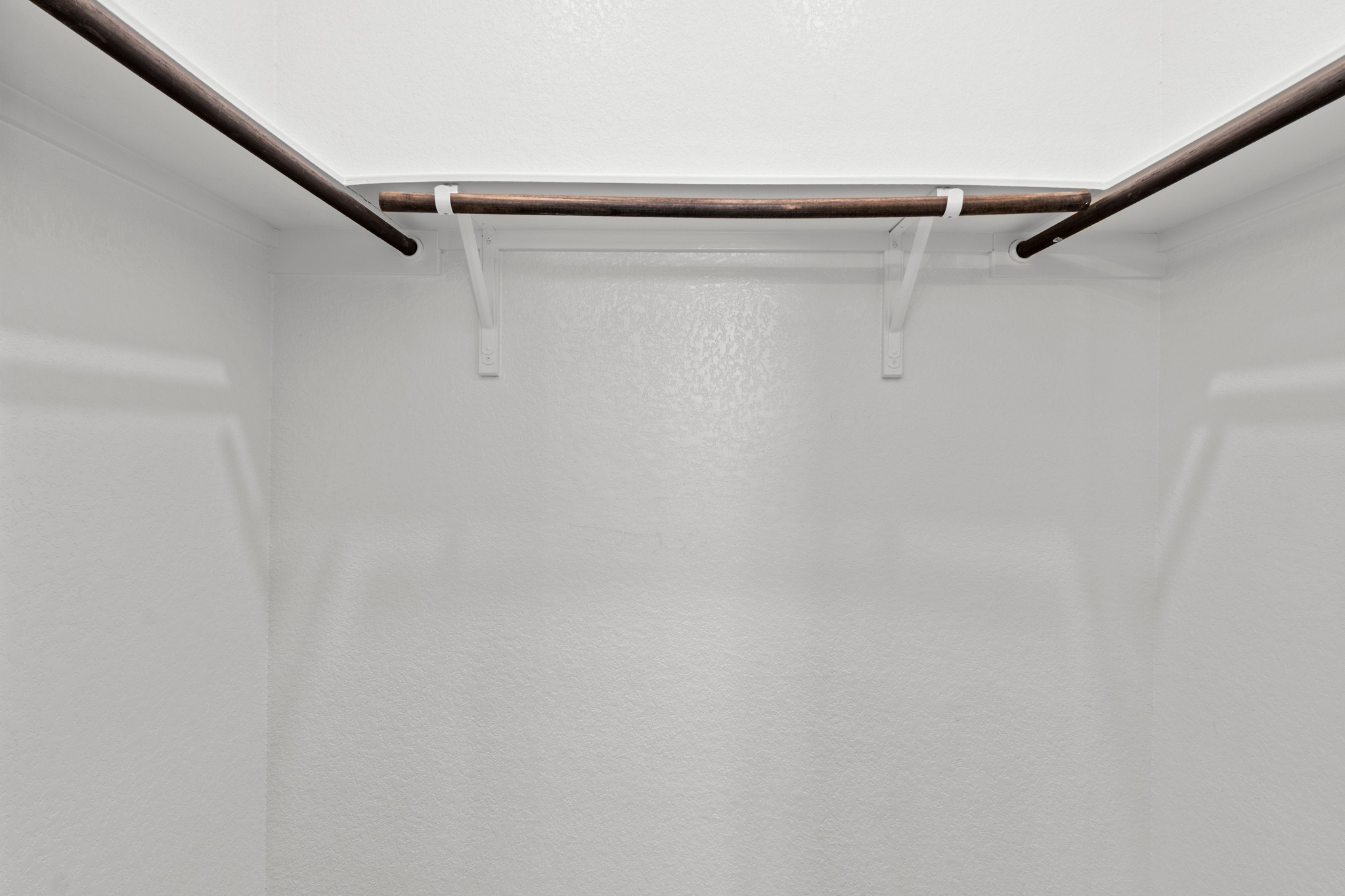 1101 Skeeter Cove Austin, TX 78748 - Photo 17 of 31 Ample hanging space for organized storage in this well-appointed closet.