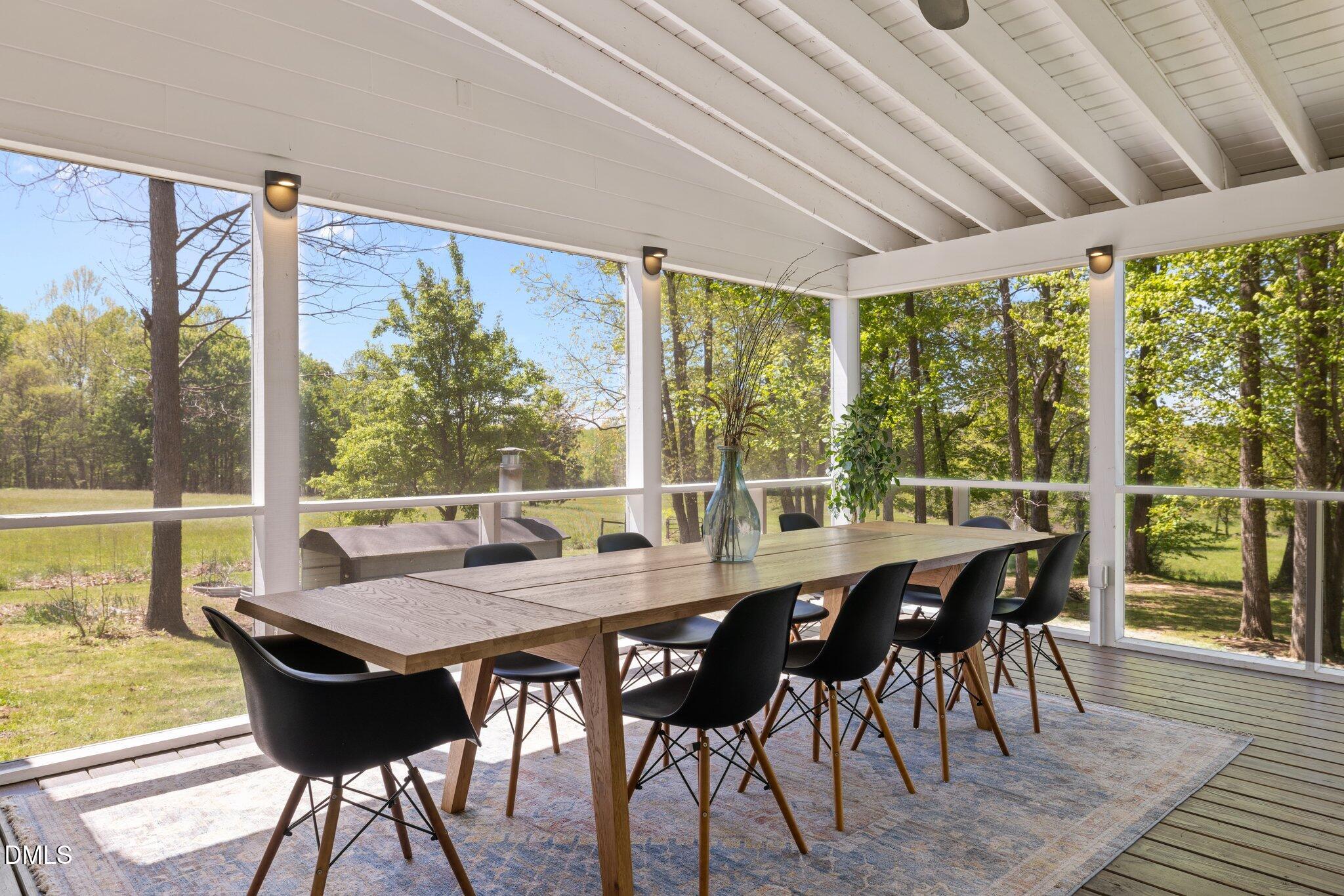 9400 Wheelers Church Road Cedar Grove, NC 27231 - Photo 23 of 96 a view of a dining room with furniture window and outside view