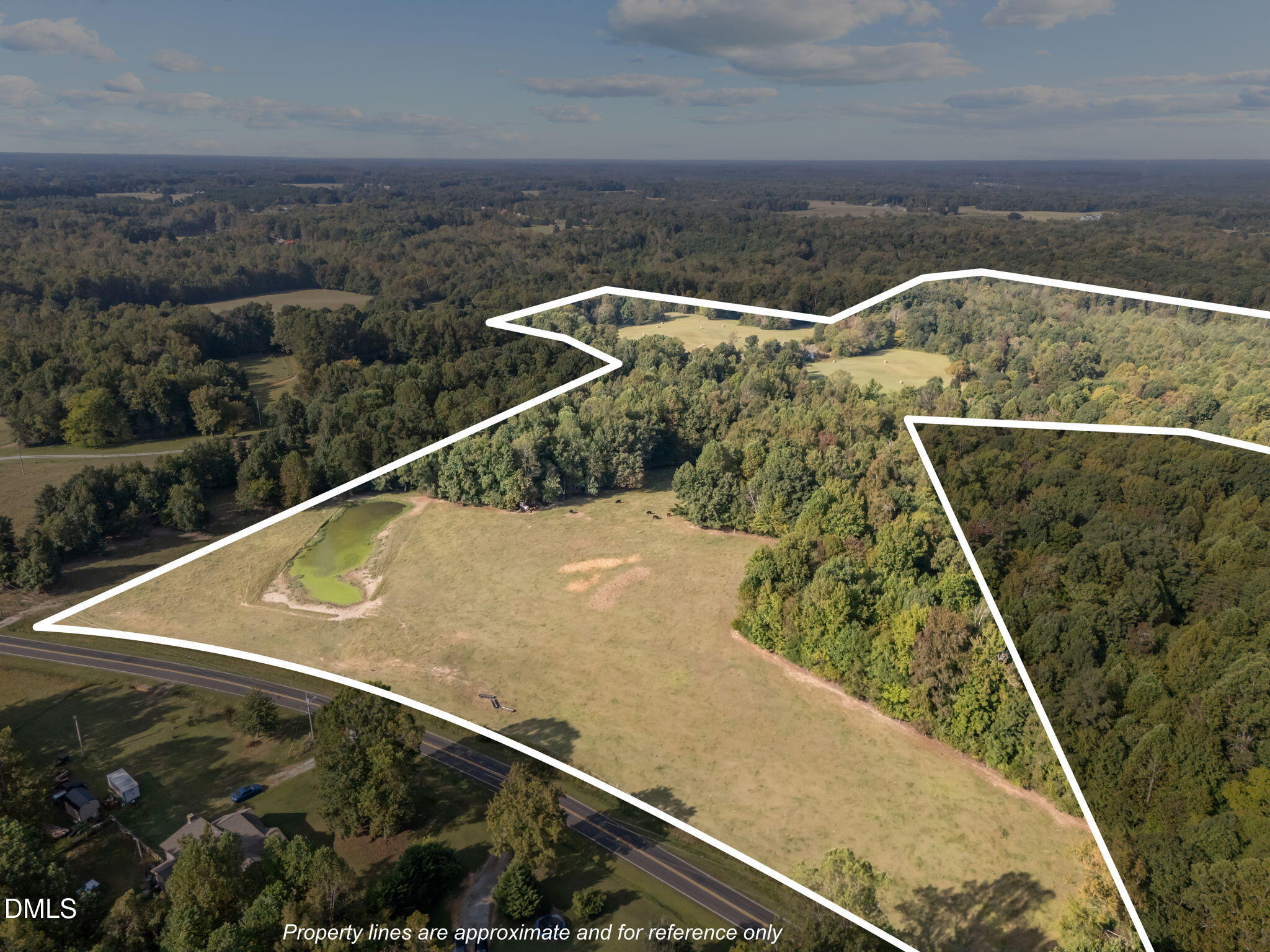 9400 Wheelers Church Road Cedar Grove, NC 27231 - Photo 68 of 96 a view of a tennis court