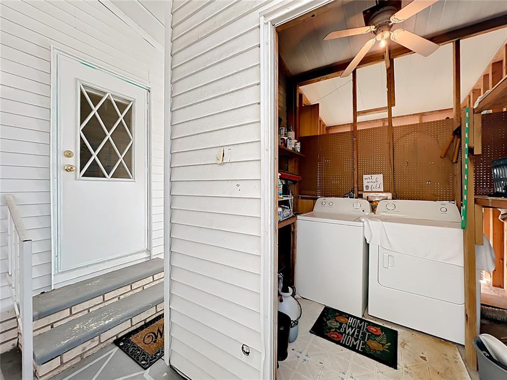 25125 Bellevue Leesburg, FL 34748 - Photo 34 of 44 a utility room with dryer and washer