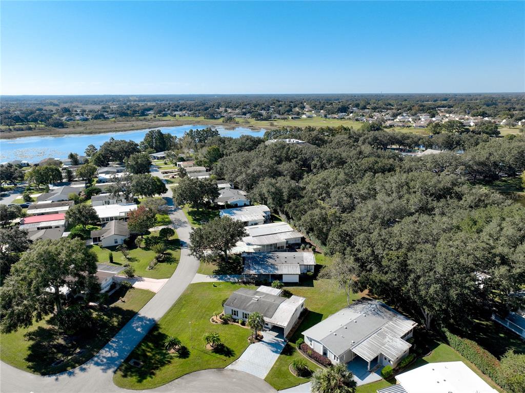 25125 Bellevue Leesburg, FL 34748 - Photo 41 of 44 an aerial view of a residential houses with outdoor space