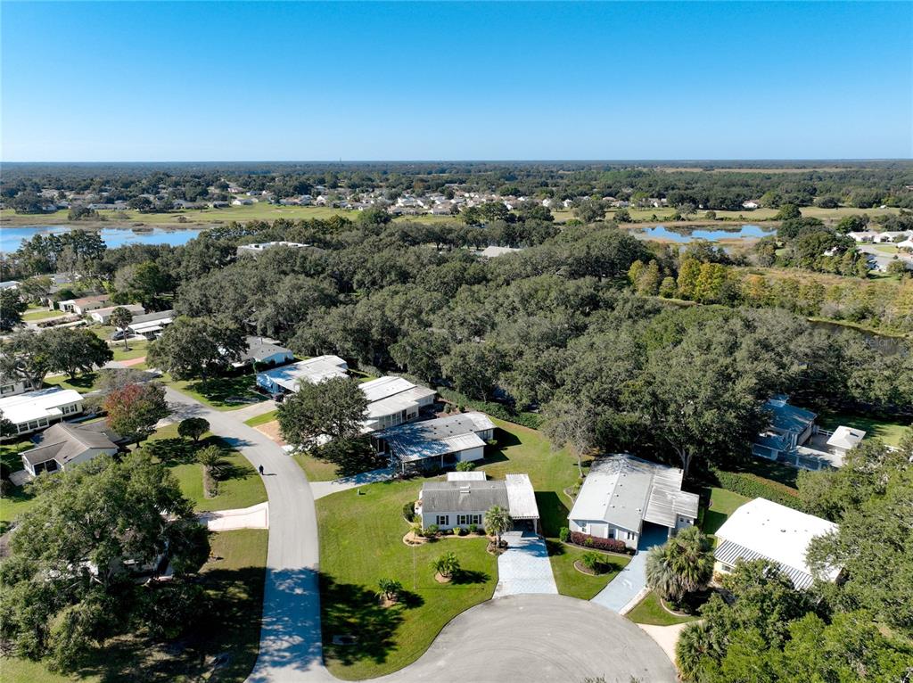 25125 Bellevue Leesburg, FL 34748 - Photo 42 of 44 an aerial view of a residential houses with outdoor space