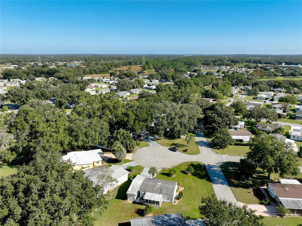 25125 Bellevue Leesburg, FL 34748 - Photo 43 of 44 an aerial view of a house with a yard