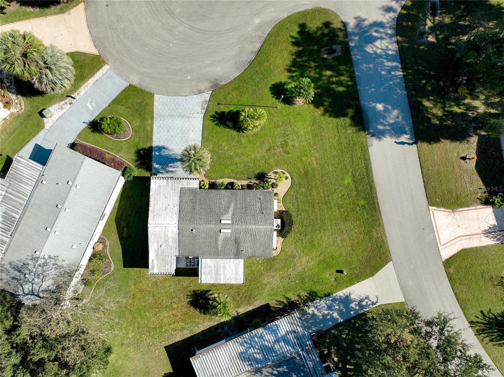 25125 Bellevue Leesburg, FL 34748 - Photo 44 of 44 an aerial view of a house