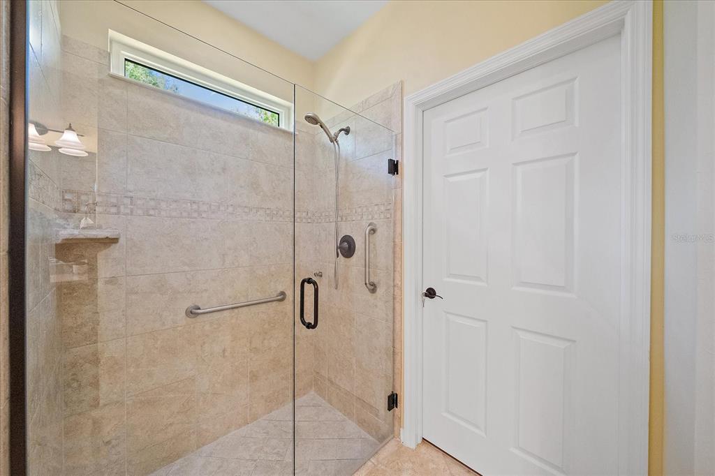 6713 Chester Trail Lakewood Ranch, FL 34202 - Photo 23 of 45 a bathroom with a shower