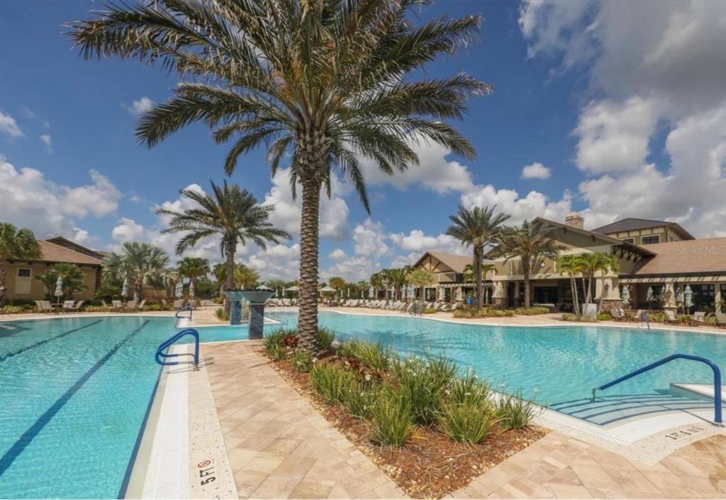 6713 Chester Trail Lakewood Ranch, FL 34202 - Photo 41 of 45 a view of a swimming pool and a longer chairs