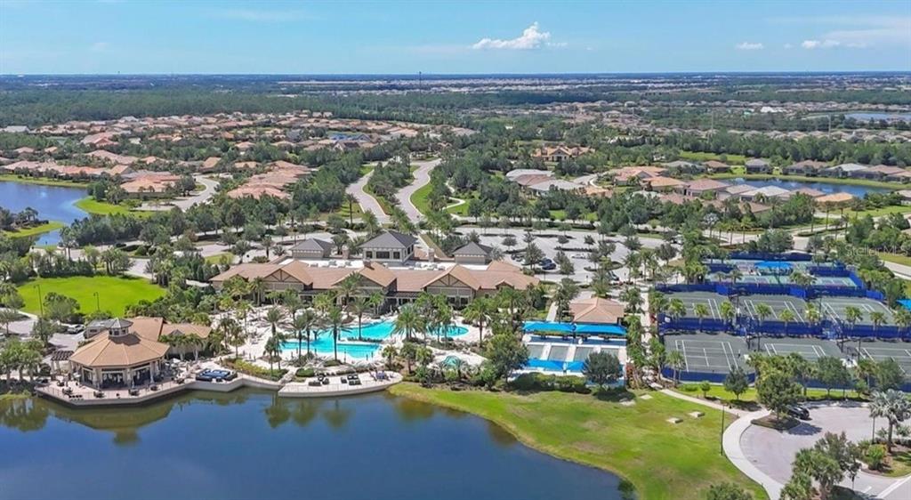 6713 Chester Trail Lakewood Ranch, FL 34202 - Photo 45 of 45 an aerial view of a house with a swimming pool outdoor seating and yard