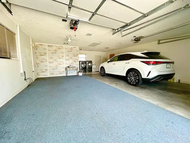 a view of swimming pool with a yard