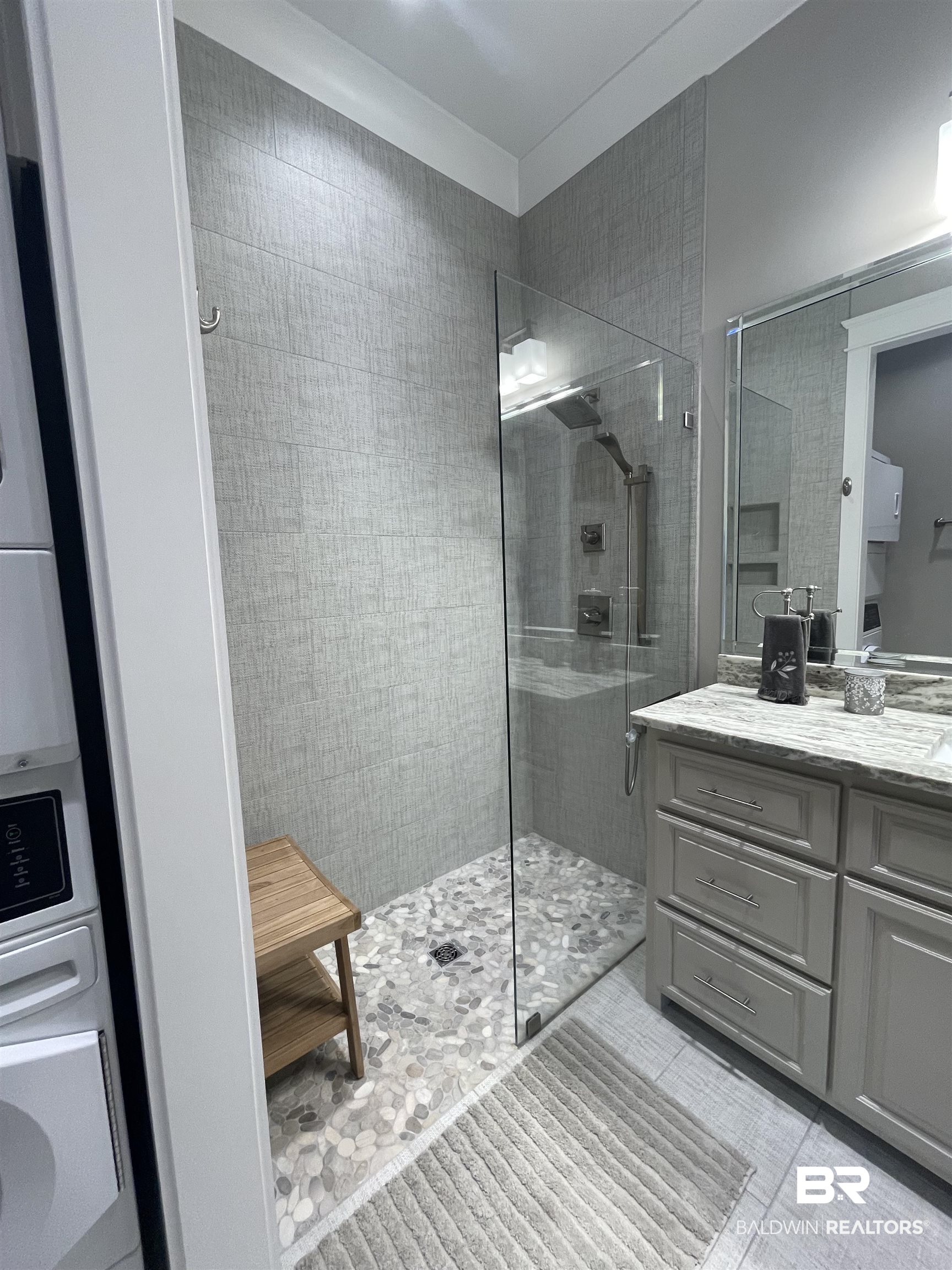 6 Fairhope Motorcoach Loop Fairhope, AL 36532 - Photo 13 of 33 Bathroom with vanity, a tile shower, and tile patterned floors