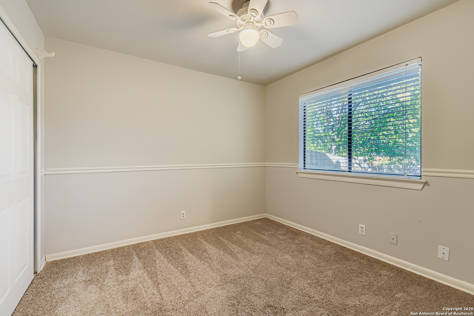 15018 Spring Shower San Antonio, TX 78247 - Photo 18 of 29 an empty room with a window
