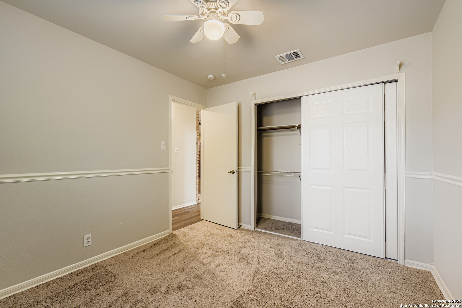 15018 Spring Shower San Antonio, TX 78247 - Photo 19 of 29 a view of an empty room with a fan