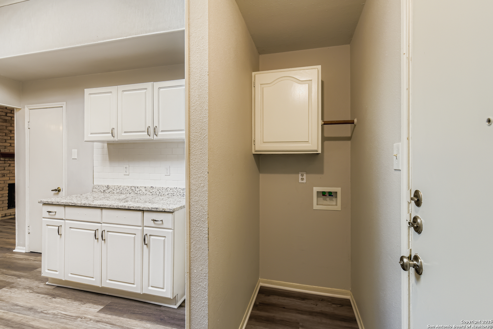 15018 Spring Shower San Antonio, TX 78247 - Photo 24 of 29 a bathroom with a granite countertop sink and a mirror