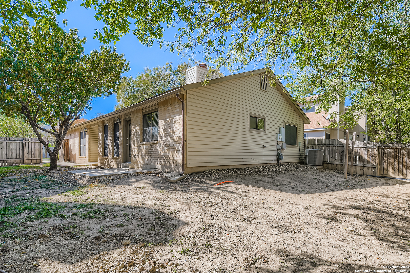 15018 Spring Shower San Antonio, TX 78247 - Photo 27 of 29 a view of a house with a yard