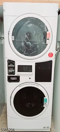 a utility room with a sink and toilet