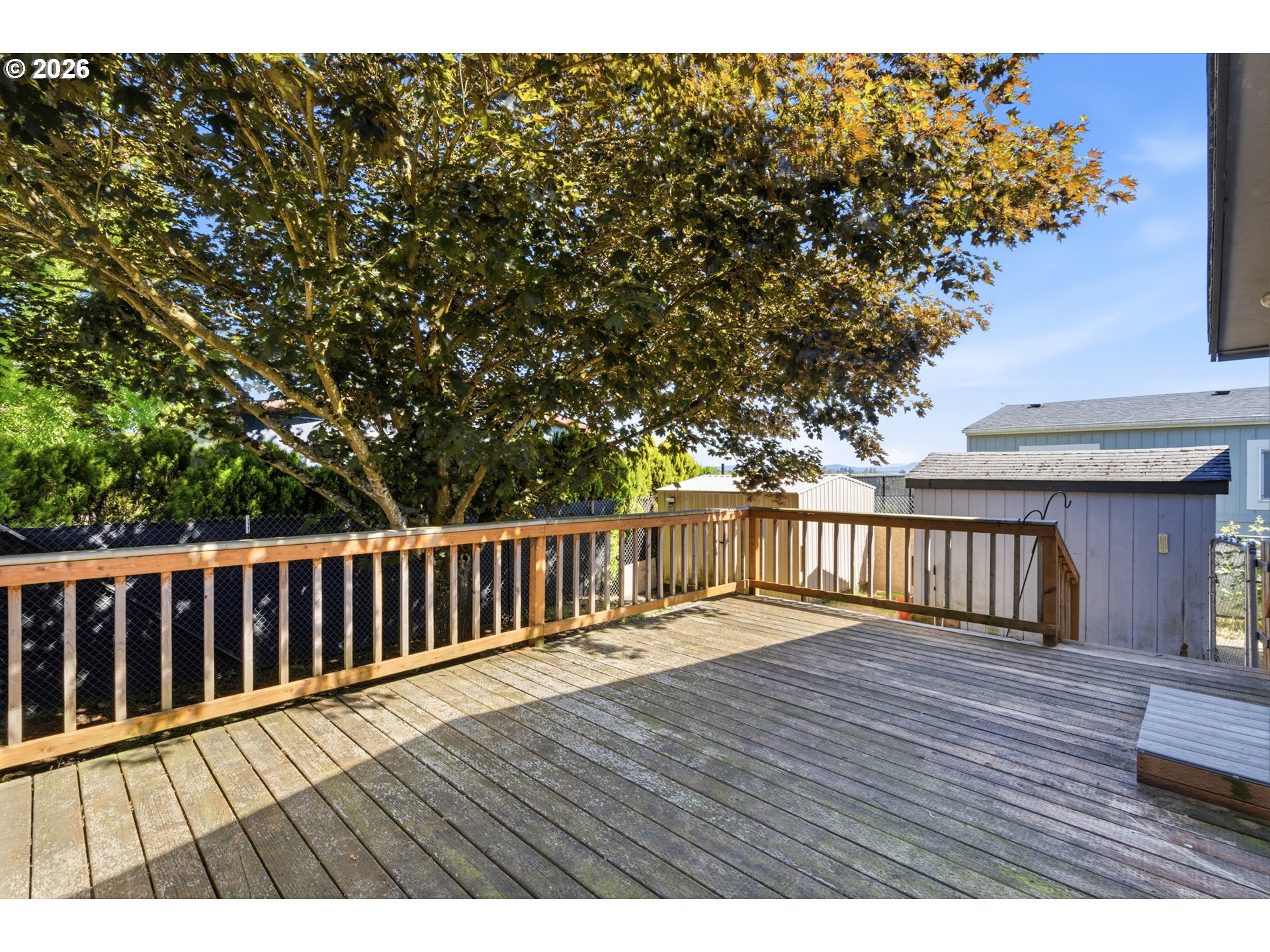 2151 Three Lakes Road Southeast Albany, OR 97322 - Photo 22 of 25 a view of deck with wooden floor and fence