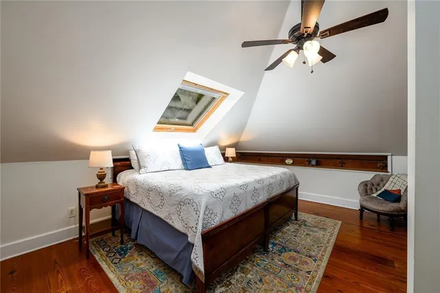 a room with furniture and wooden floor