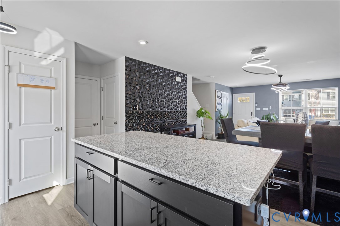 5466 Niles Road Richmond, VA 23234 - Photo 16 of 31 a kitchen with a table and chairs