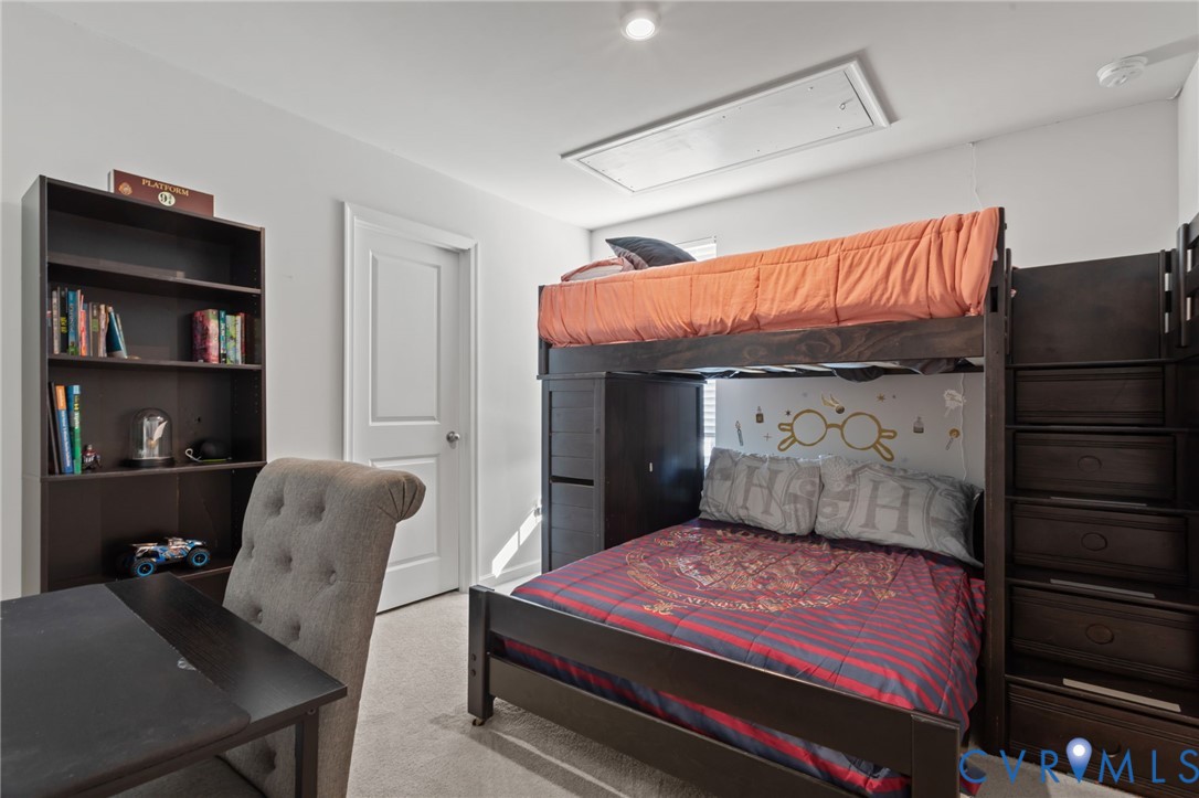 5466 Niles Road Richmond, VA 23234 - Photo 17 of 31 a bedroom with a bed and furniture