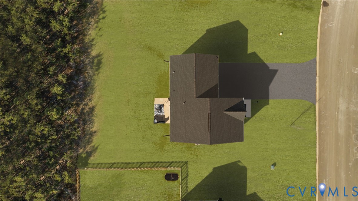 5466 Niles Road Richmond, VA 23234 - Photo 31 of 31 an aerial view of a house with a yard