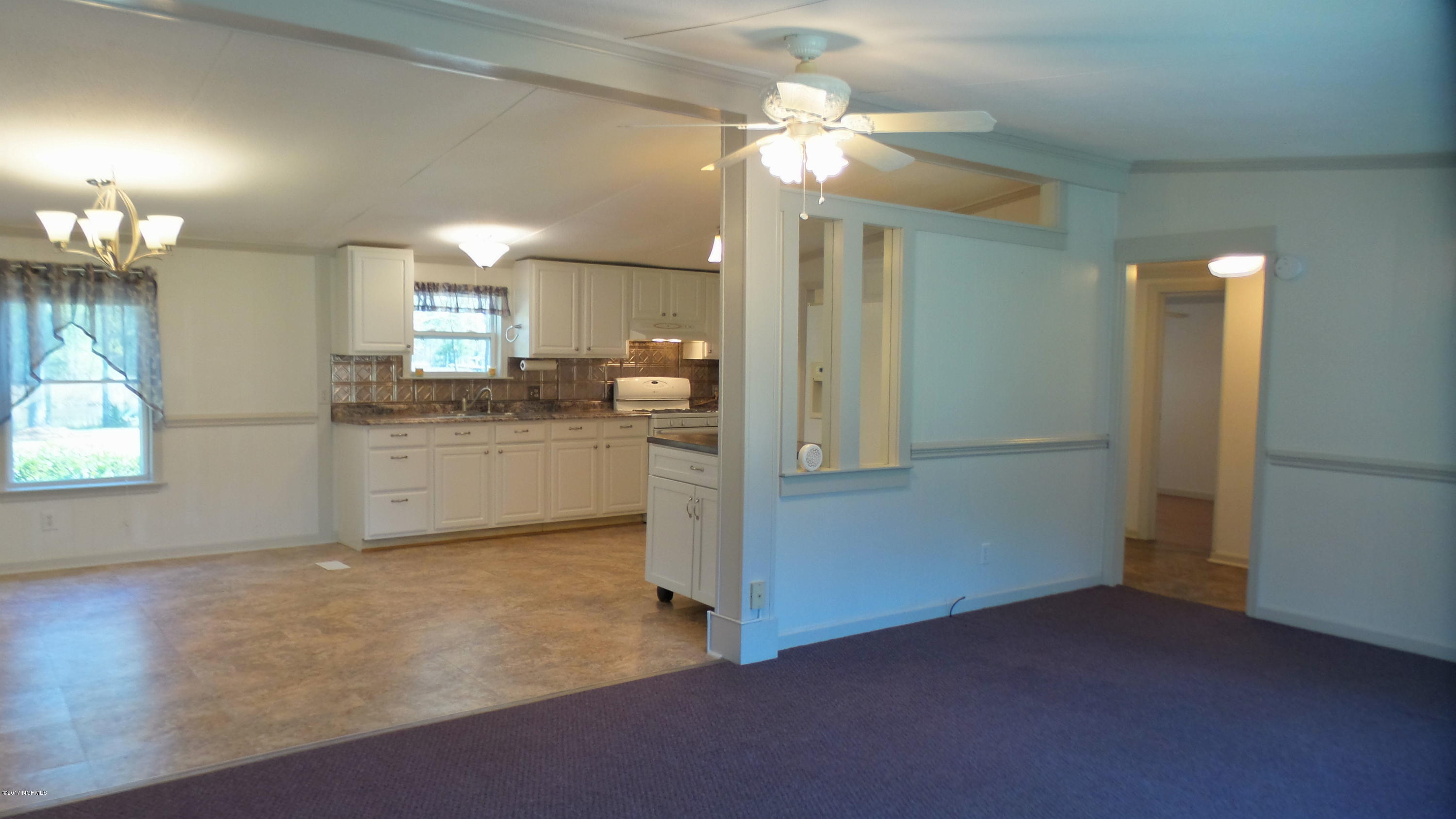 3537 Whortonsville Road Merritt, NC 28556 - Photo 13 of 44 Living Room to Kitchen