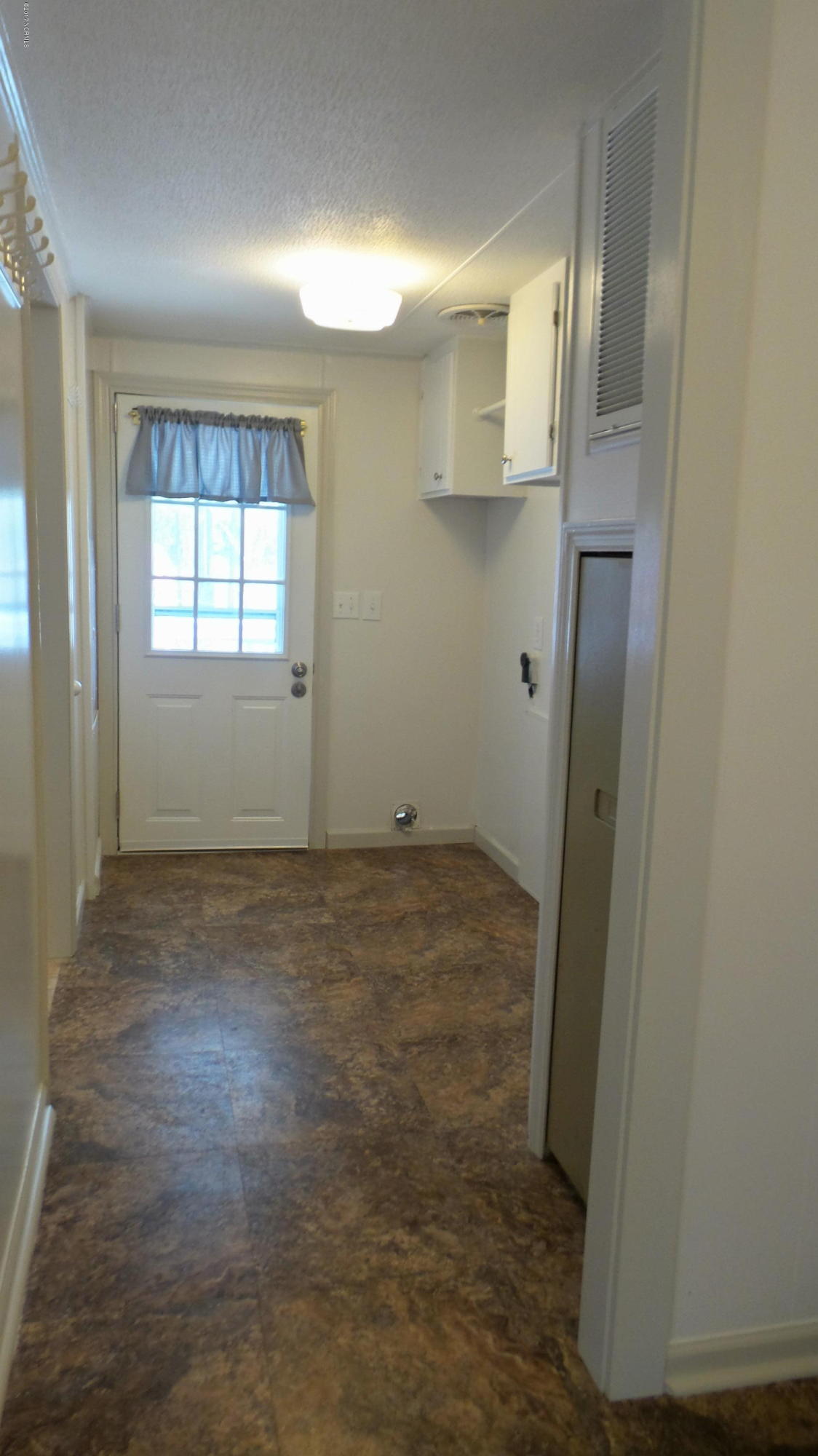 3537 Whortonsville Road Merritt, NC 28556 - Photo 29 of 44 Hall to Laundry/Mudroom