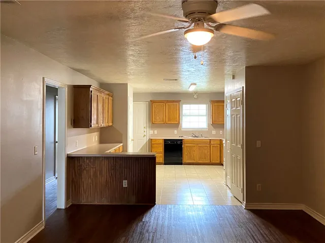 a view of a kitchen from a living room