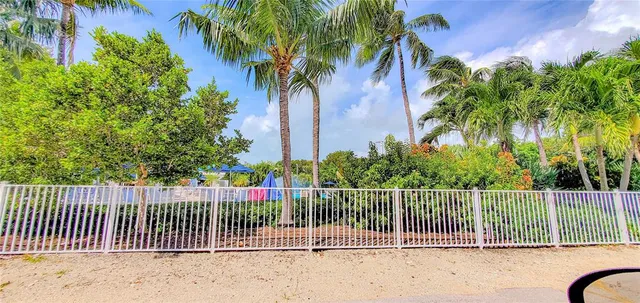 a view of a fence and a staircase