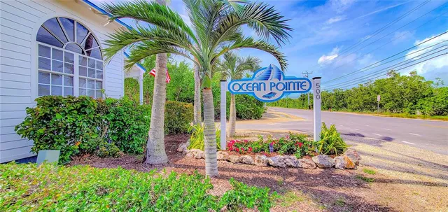 a sign on the side of the road